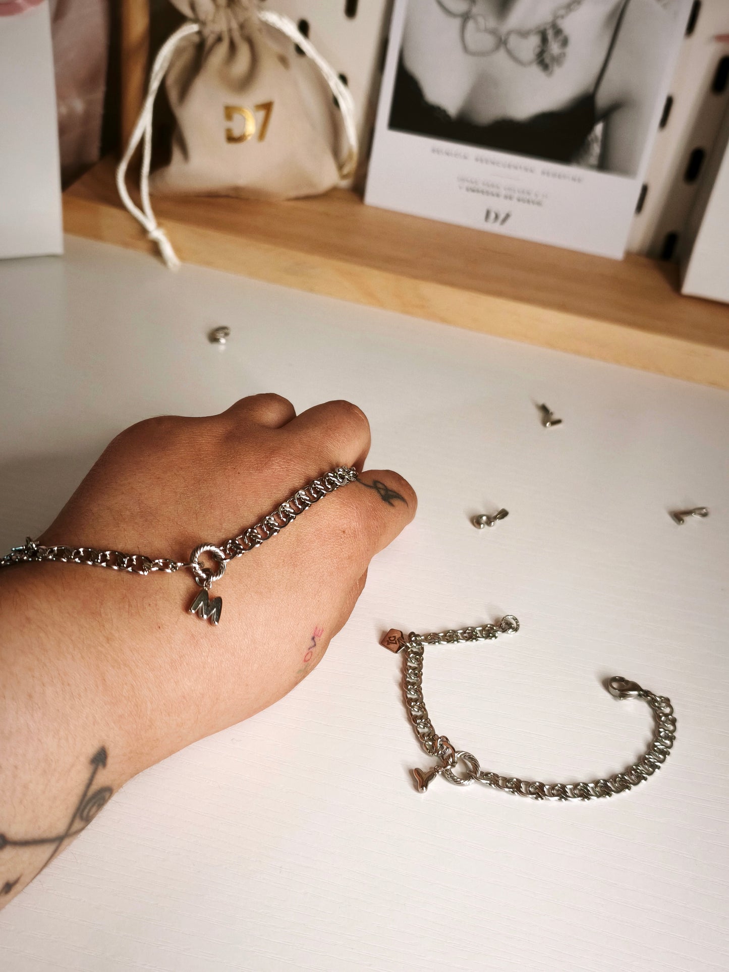 Pulsera Inicial RESET x D7 - Plata